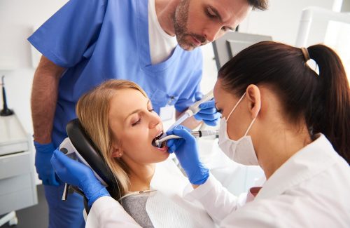 young-woman-is-getting-treatment-in-dentists-T8PLH8Y.jpg